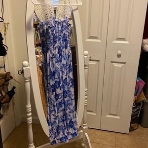 Floral blue and white summer dress. Never worn, no tags. Size M-L.